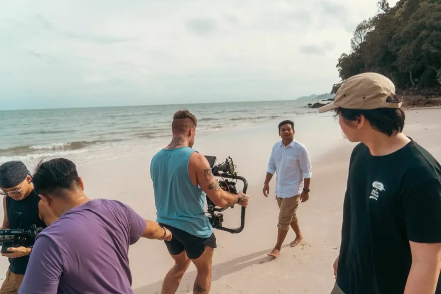 MZP Asia crew filming on a beach in Thailand.